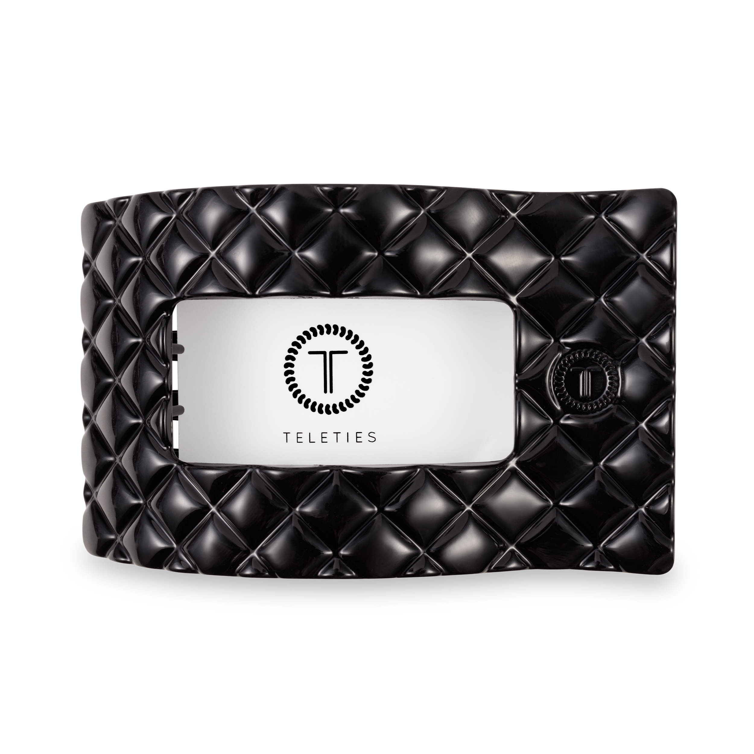 Black quilted clutch with a silver card holder on a white background