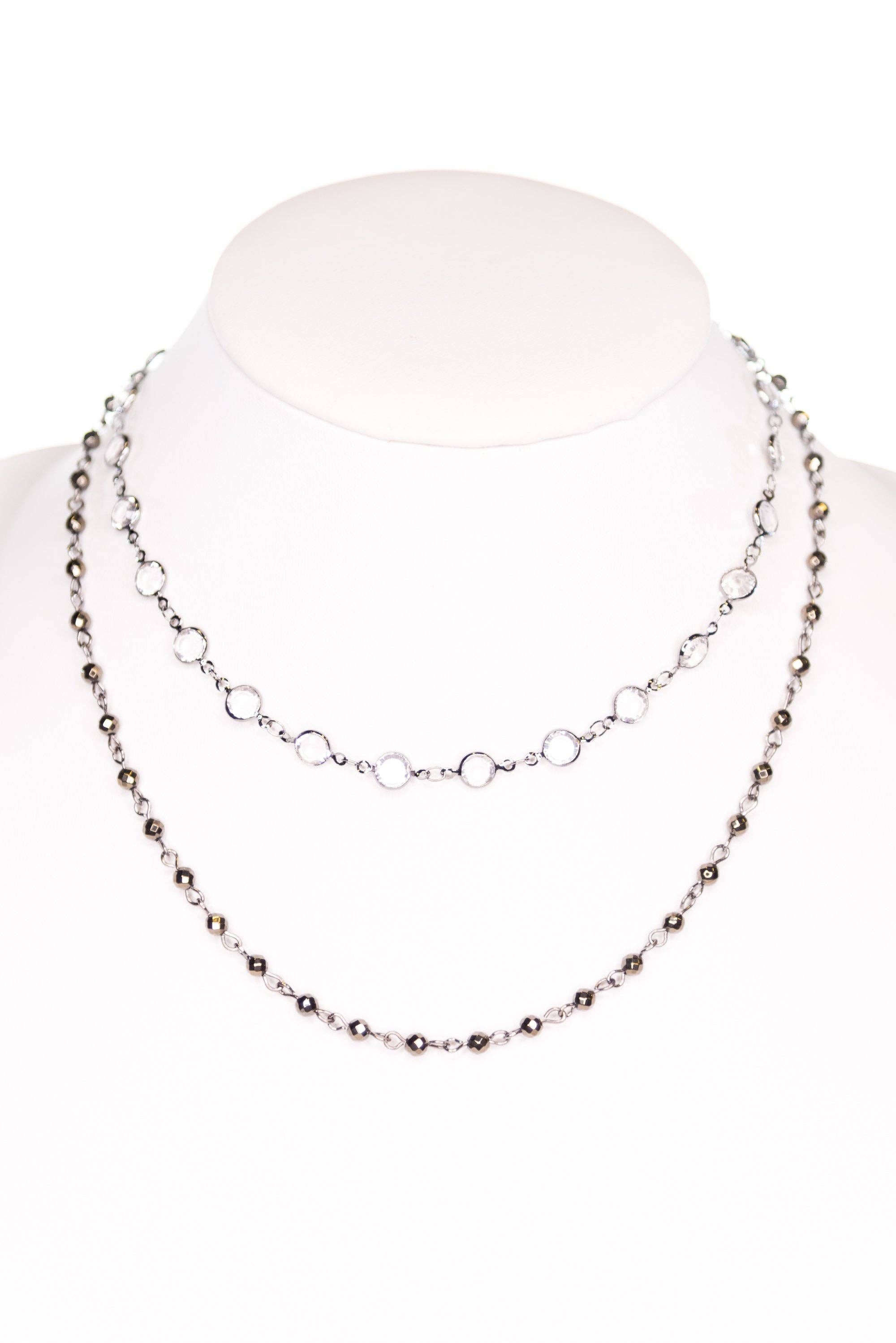 Necklace on a mannequin with a white background