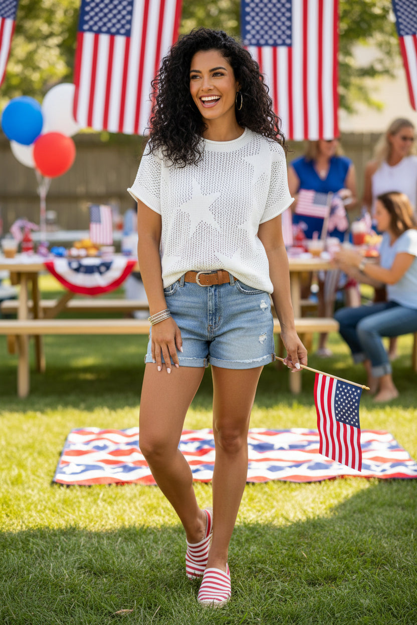 Woman wearing a white mesh top on a white background